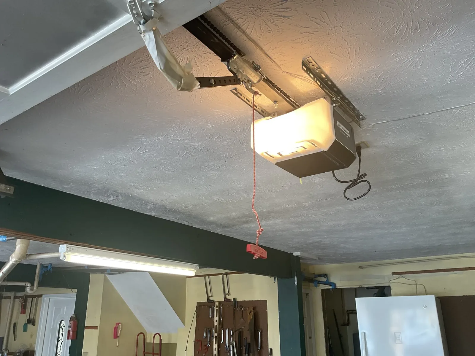 New garage door motor installed after replacement